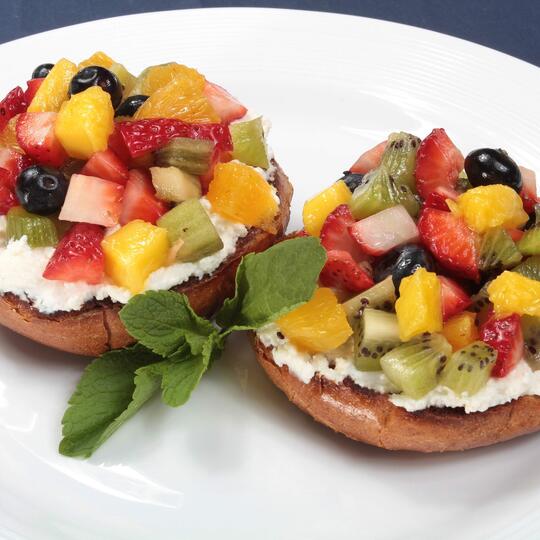 Creamy Ricotta-Fruit Bagel with Honey Drizzle