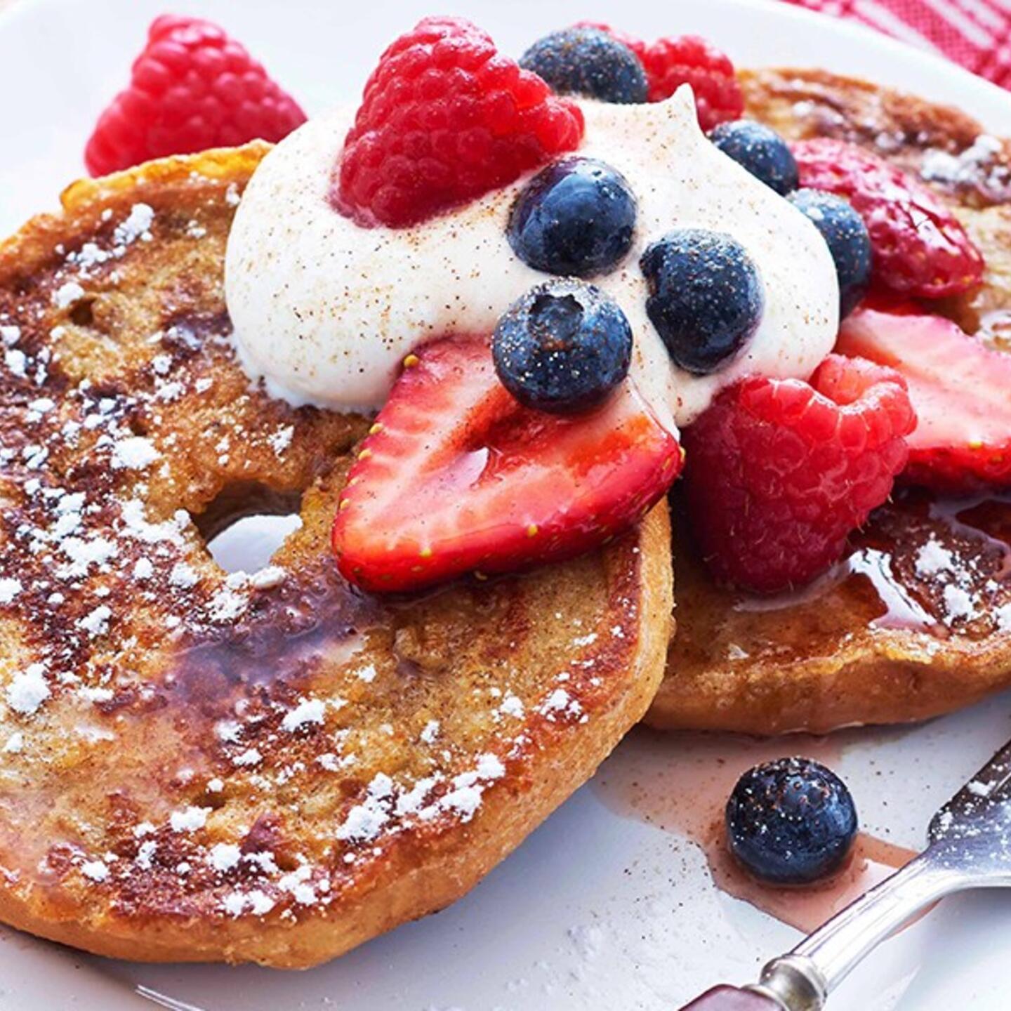 Maple French Toast topped with whipped cream and berries