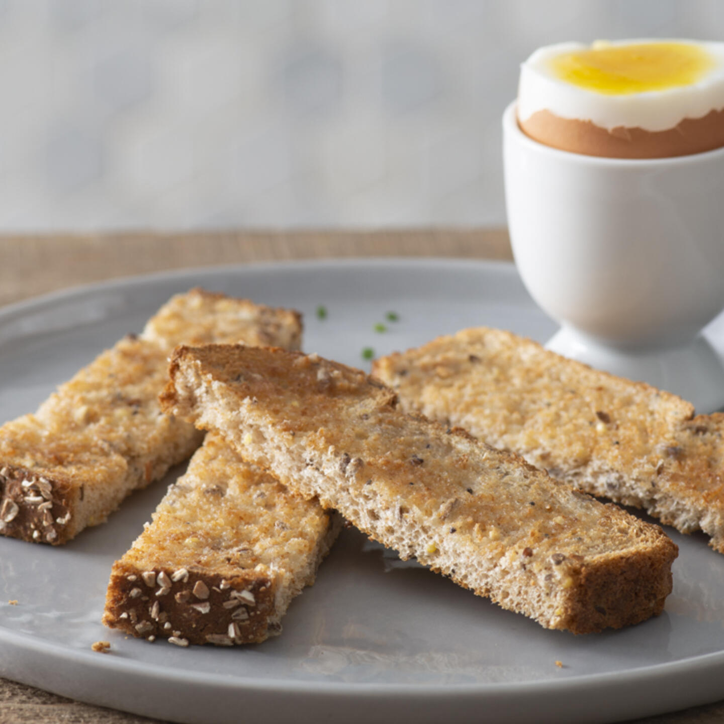 slices of bread laid next to boiled egg